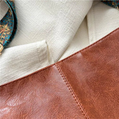 Women's bohemian-style handbag with vintage embroidery and a wide strap