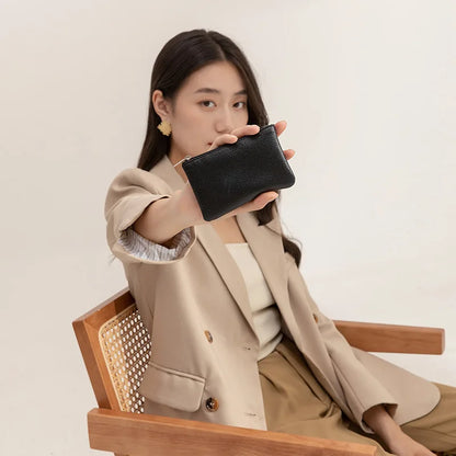 Small and elegant women's wallet with zipper closure, card holder and key holder