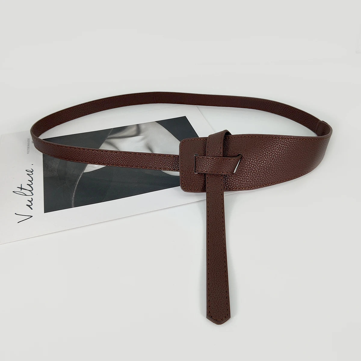 High-quality women's belt in soft leather with a knot, long and wide band, ideal for wearing with coats and dresses