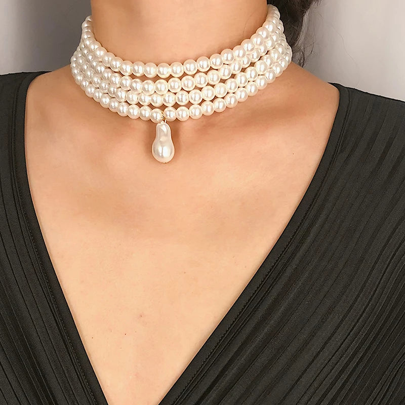Sophisticated and elegant classic multi-strand choker necklace featuring round pearls and a pearl pendant, perfect for parties and other special occasions