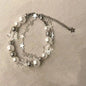 Adjustable bracelet with a double zinc alloy chain, featuring pearls and resin stars, ideal as a gift for girls. Beautiful, lightweight, and charming