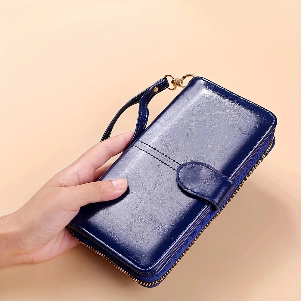 Women's leather wallet with coin and card compartments, available in a variety of colors.