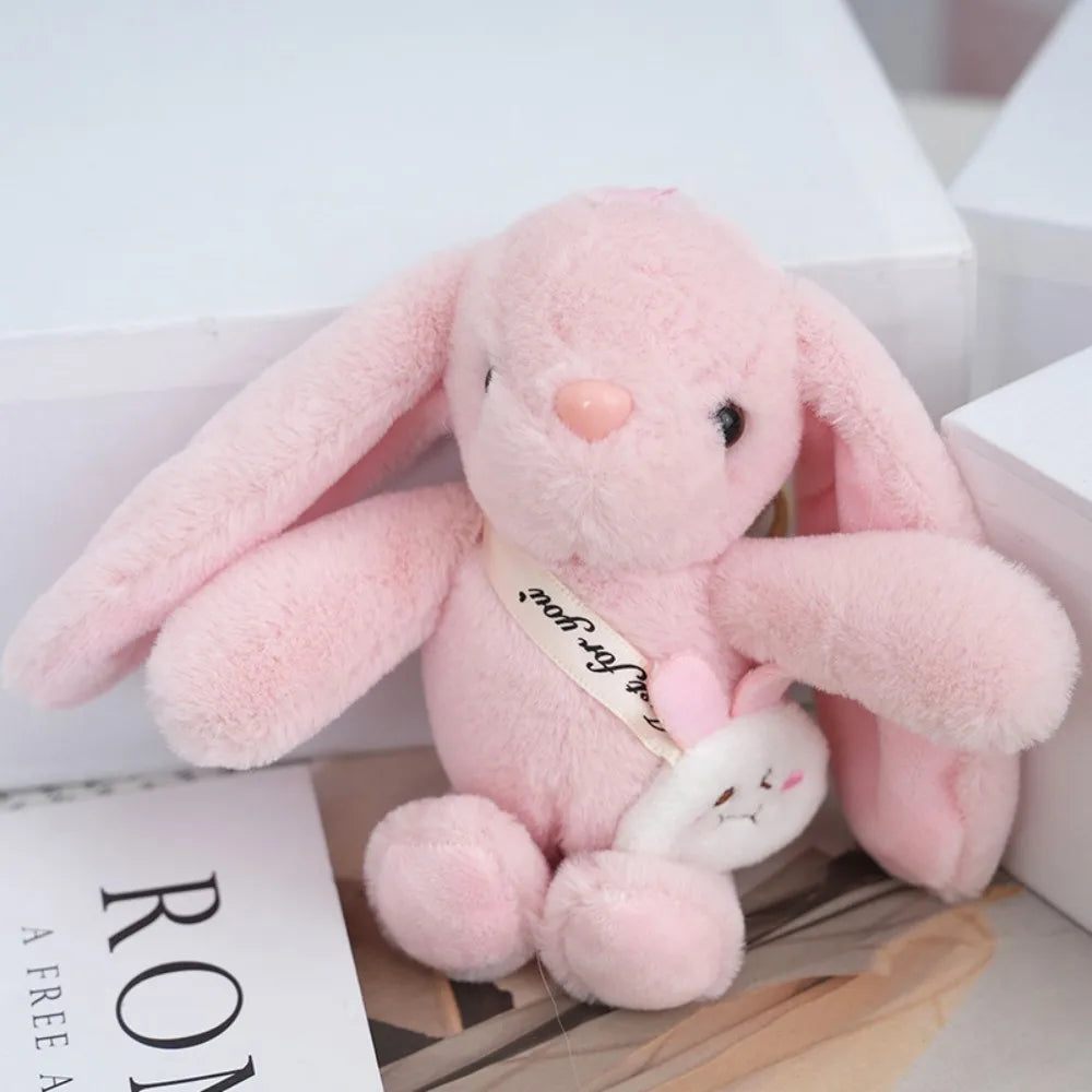 Adorable and fun women's keychain with a rabbit fur pendant.