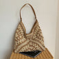 Popular women's shoulder bag in woven straw, medium size, with strap, ideal for the beach