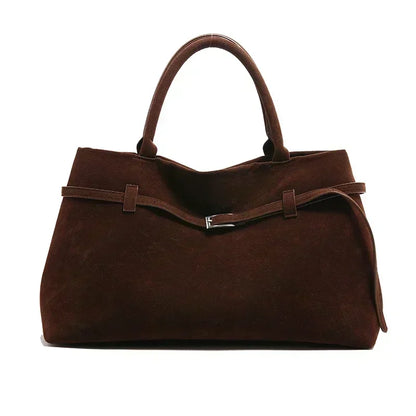 Women's handbag made of synthetic suede with a decorative buckle, large capacity, and snap closure