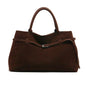 Women's handbag made of synthetic suede with a decorative buckle, large capacity, and snap closure