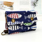 Women's wallet with cartoon print for girls, with key holder and coin purse in various designs.