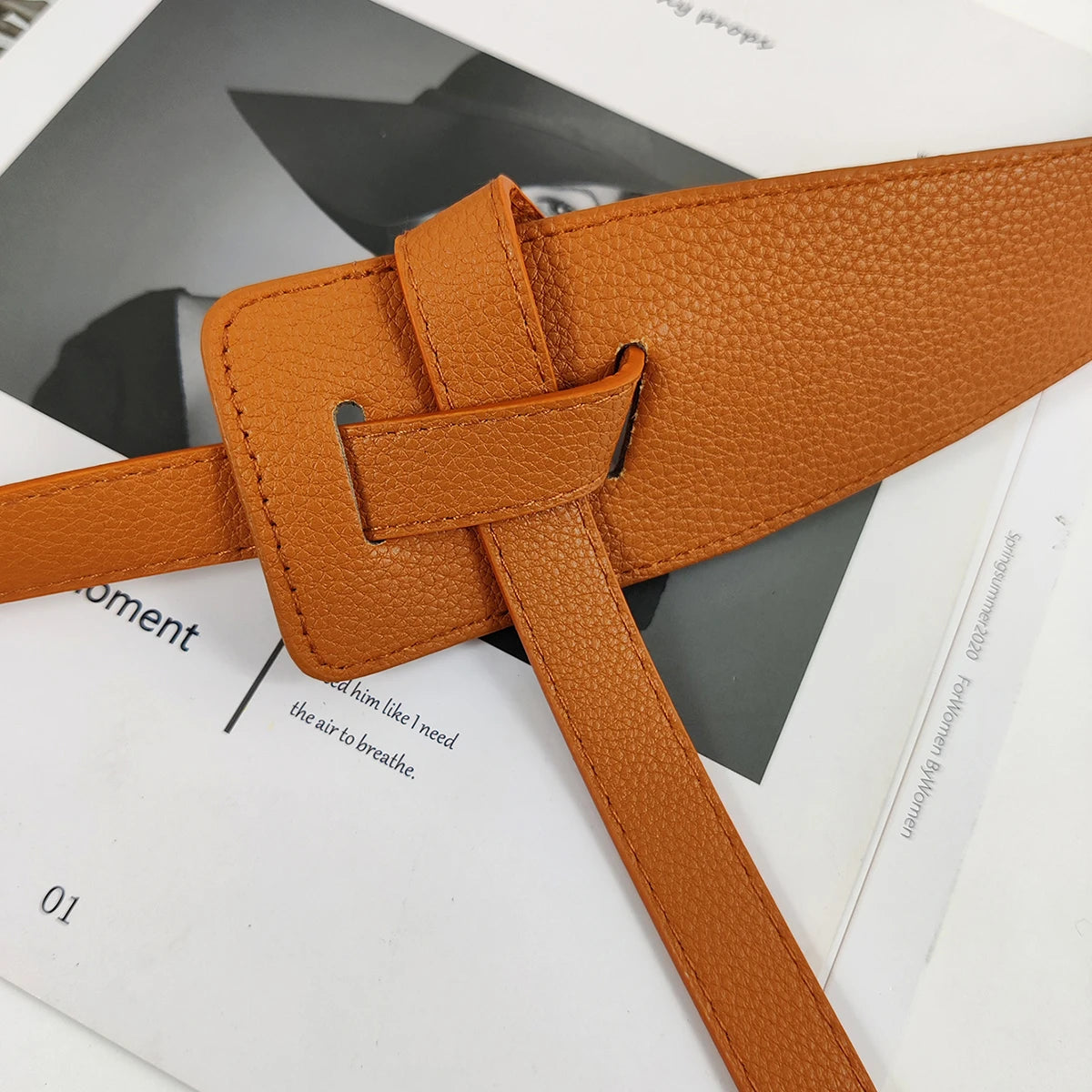 High-quality women's belt in soft leather with a knot, long and wide band, ideal for wearing with coats and dresses