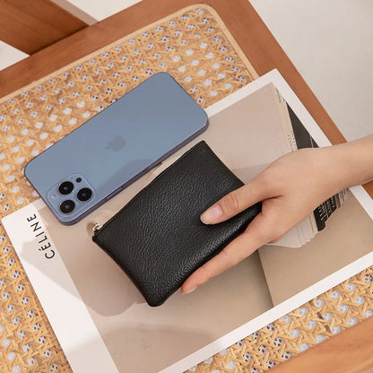 Small and elegant women's wallet with zipper closure, card holder and key holder