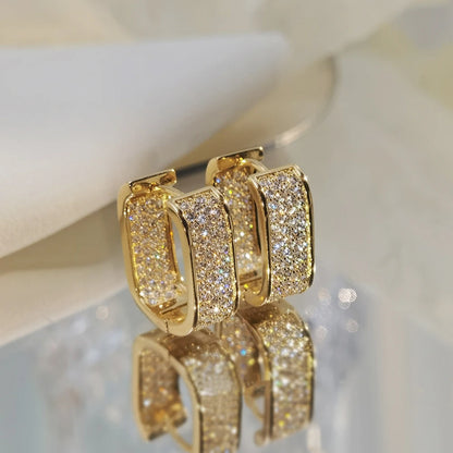 Women's silver or gold hoop earrings set with cubic zirconia