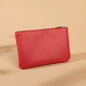 Small and elegant women's wallet with zipper closure, card holder and key holder