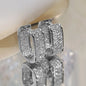 Women's silver or gold hoop earrings set with cubic zirconia