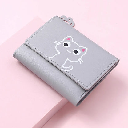 Small and compact women's wallet for girls with a cat print, featuring card slots and a bill compartment.