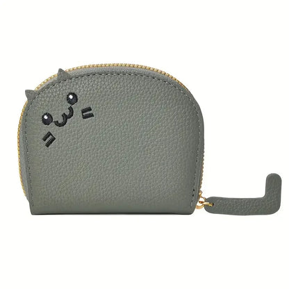 Card holder with a cat-shaped design and multiple compartments.