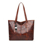 Stylish and elegant women's square tote bag with a horizontal zipper, suitable for carrying by hand or on the shoulder