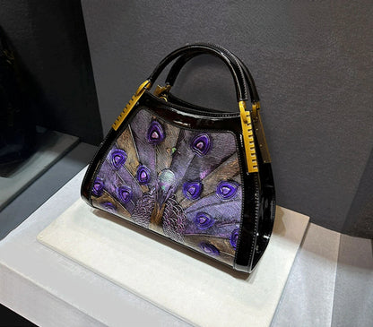 On sale! Women's handbag in high-quality cowhide leather with a peacock print. Shoulder strap is adjustable