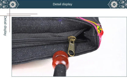Small women's shoulder bag with floral embroidery, top handle, and flap with bead embellishments
