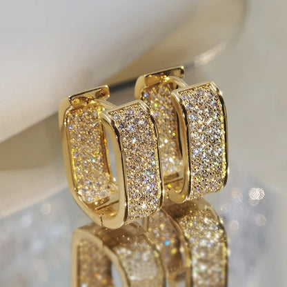 Women's silver or gold hoop earrings set with cubic zirconia
