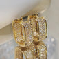 Women's silver or gold hoop earrings set with cubic zirconia
