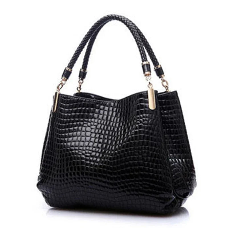 Women's satchel and tote bag with crocodile print and top handle. Stylish