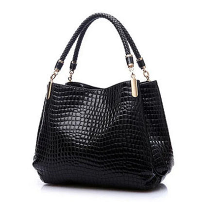 Women's satchel and tote bag with crocodile print and top handle. Stylish