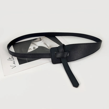 High-quality women's belt in soft leather with a knot, long and wide band, ideal for wearing with coats and dresses