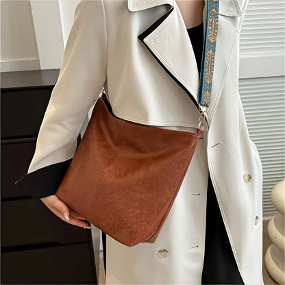 Women's bohemian-style handbag with vintage embroidery and a wide strap