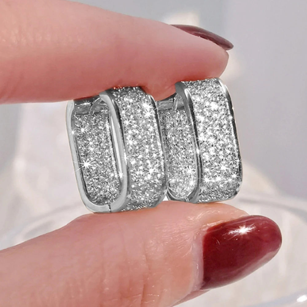 Women's silver or gold hoop earrings set with cubic zirconia