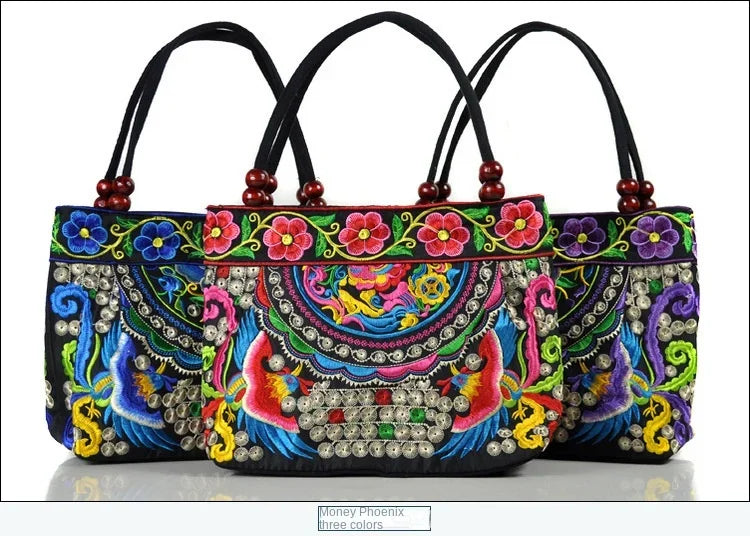Small women's shoulder bag with floral embroidery, top handle, and flap with bead embellishments