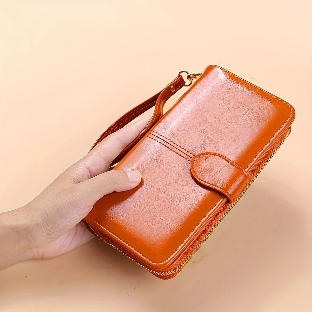 Women's leather wallet with coin and card compartments, available in a variety of colors.