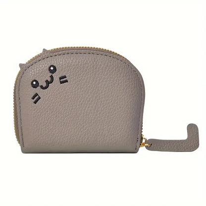 Card holder with a cat-shaped design and multiple compartments.