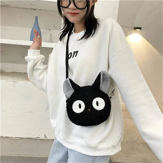 Japanese-style girl's bag in the shape of a plush cat, ideal for wearing on the shoulder or crossbody, compact enough for a cell phone and a wallet