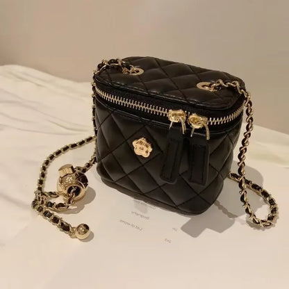 Small women's crossbody bag with a chain strap