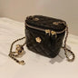 Small women's crossbody bag with a chain strap
