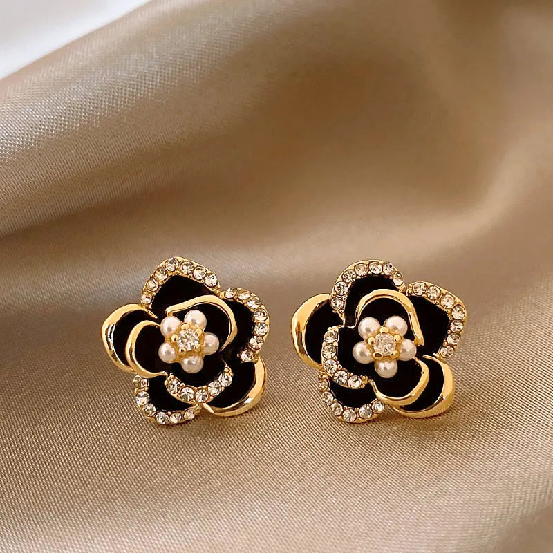 Black Camellia earrings with embedded cubic zirconia and rhinestones, modern and delicate