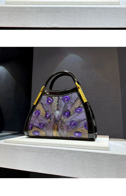 On sale! Women's handbag in high-quality cowhide leather with a peacock print. Shoulder strap is adjustable