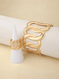 Bracelet and ring set with a geometric design of intertwined and sinuous links, with an adjustable opening