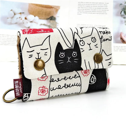 Women's wallet with cartoon print for girls, with key holder and coin purse in various designs.