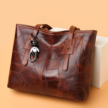 Stylish and elegant women's square tote bag with a horizontal zipper, suitable for carrying by hand or on the shoulder