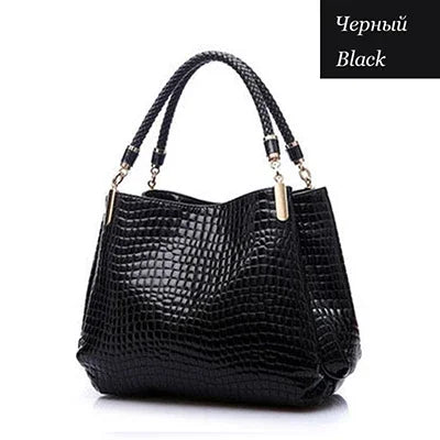 Women's satchel and tote bag with crocodile print and top handle. Stylish