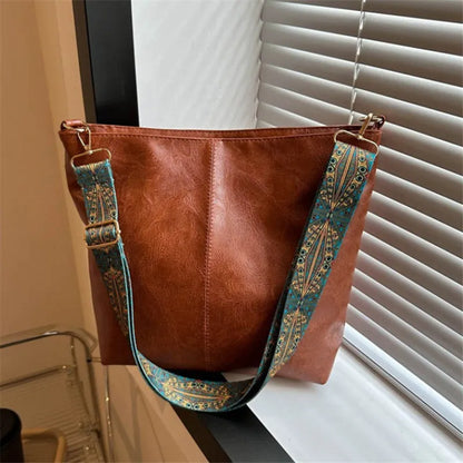 Women's bohemian-style handbag with vintage embroidery and a wide strap