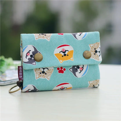 Women's wallet with cartoon print for girls, with key holder and coin purse in various designs.