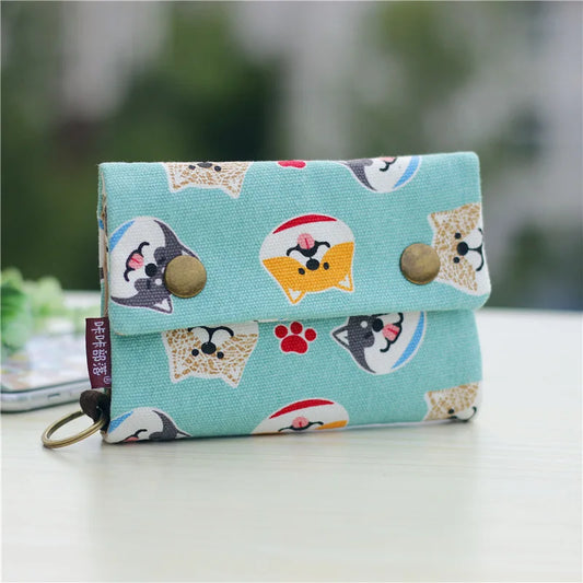 Women's wallet with cartoon print for girls, with key holder and coin purse in various designs.