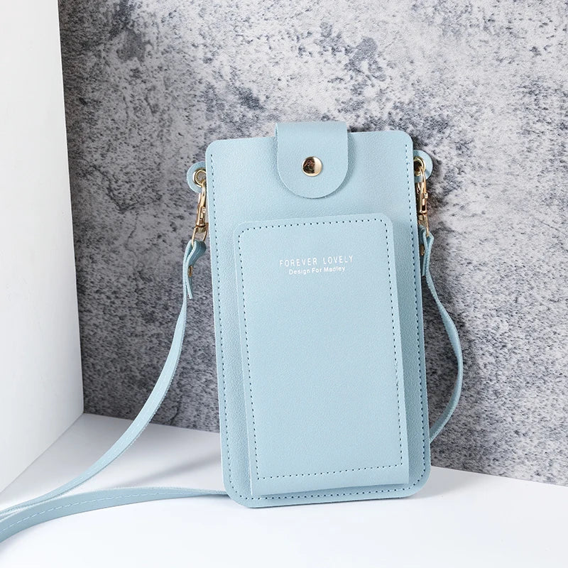 Modern shoulder bag in a solid color, with compartments for cell phone, wallets, and document holder
