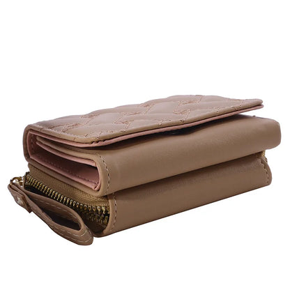 Small women's wallet in leather, elegant design, available in various colors.