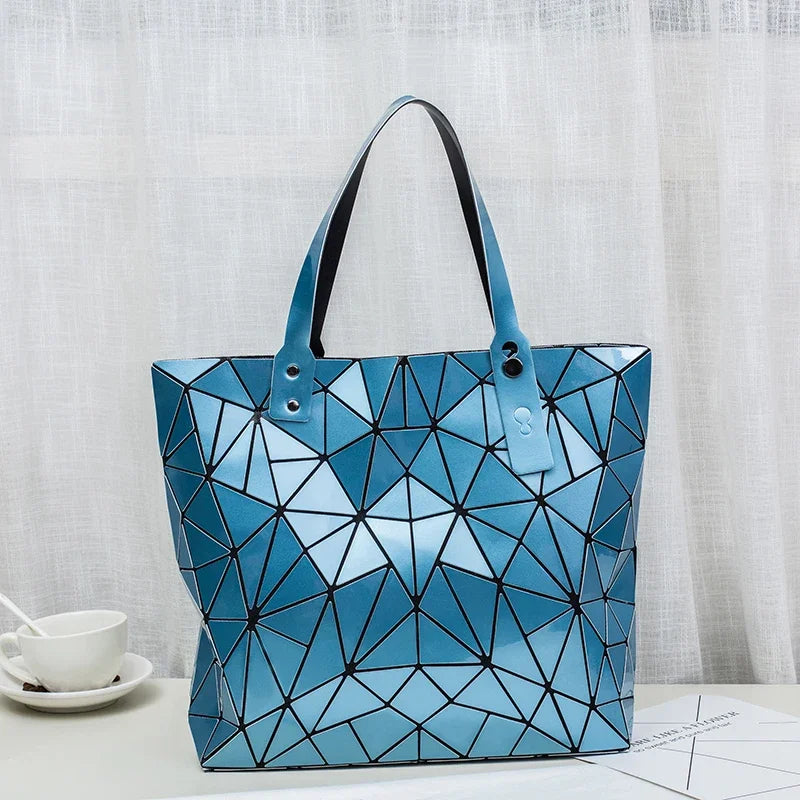 Women's beach-style holographic shoulder bag in various colors.