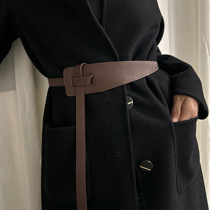 High-quality women's belt in soft leather with a knot, long and wide band, ideal for wearing with coats and dresses