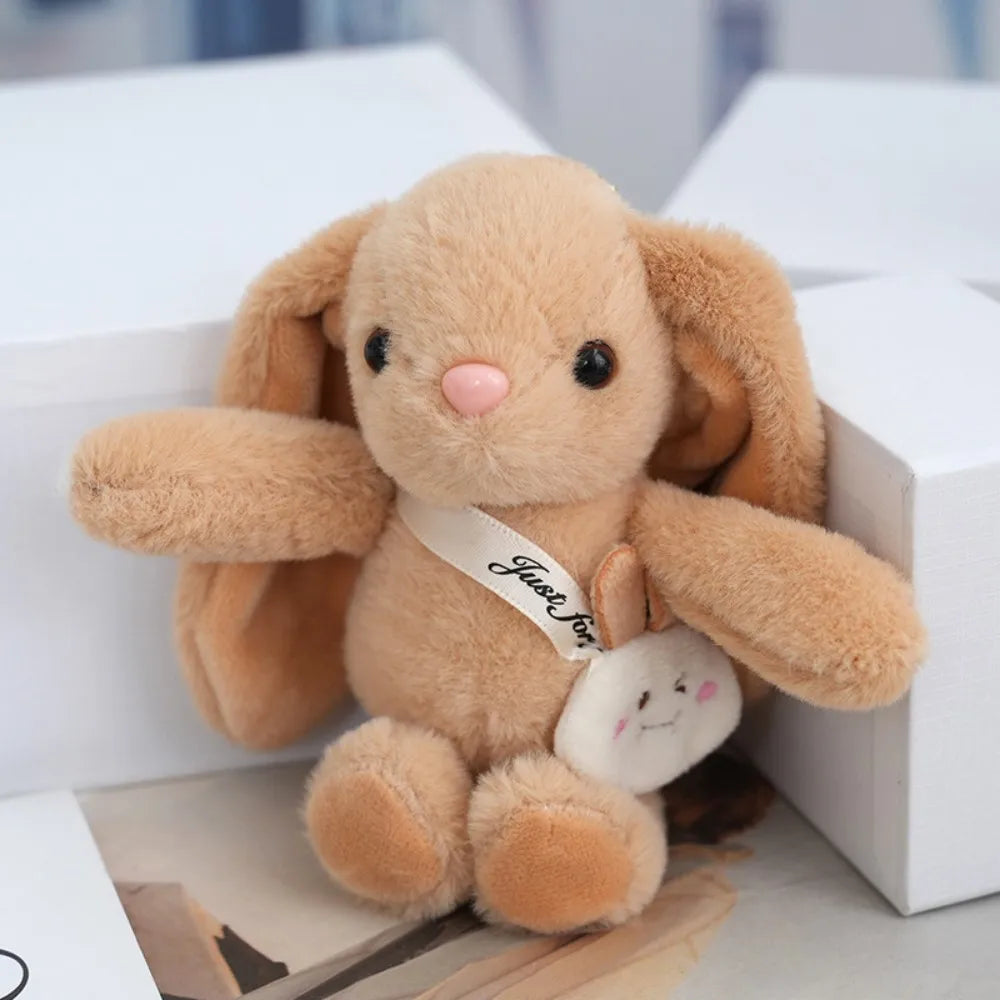 Adorable and fun women's keychain with a rabbit fur pendant.