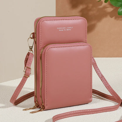 Modern, compact, and secure women's cell phone bag. Holds phones, cards, and documents