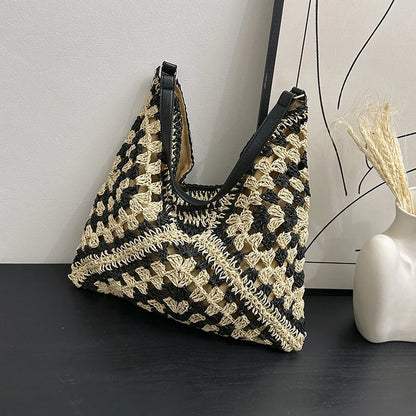 Popular women's shoulder bag in woven straw, medium size, with strap, ideal for the beach